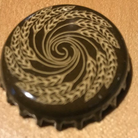 A bottle cap removed from a bottle of Bell's Double Cream Stout